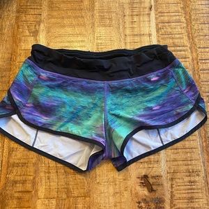 Lululemon speed up shorts, size 8, purple, pink and green colors, great quality.